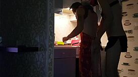 Asmodey and Jasper cook dinner in the kitchen