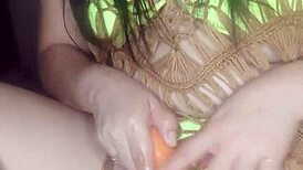 Enjoying delicious pleasure with my carrot in outdoor muff diving fun!