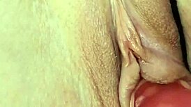 young pussy gets sweet morning masturbation in close-up view. nylon legs spread wide for solo play.