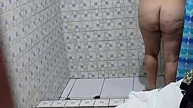 Hidden cam catches curvy Venezuelan neighbor in steamy shower