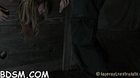 Chick Chained in Shackles Endures Hardcore BDSM Torment with Blowjob