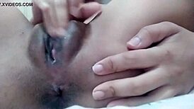 close-up of teen babe masturbating her shaved pussy to orgasm