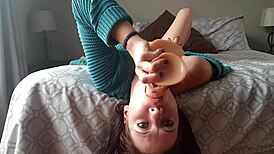 She says, 'Watch this upside down dildo gag deepthroat with choking.'