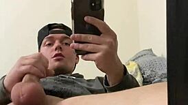Sexy Frat Guy Strokes Big Cock in Mirror and Cums Everywhere