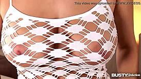 Busty Natalia Seduces with Strokes on Her Massive Tits.