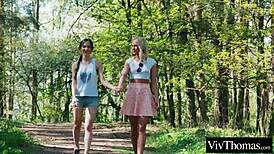 Sexy Blonde and Brunette Kiss in Forest Before Intimacy