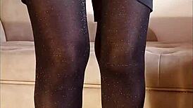 Shiny pantyhose pee in toilet with heels and feet.