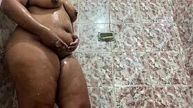 sexy petite ebony girl shakes her big ass hard in the bath