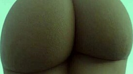 this hot black chick is showing off her massive ass on camera, teasing with her curvy body.