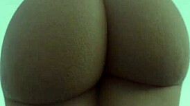 this hot black chick is showing off her massive ass on camera, teasing with her curvy body.