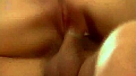 The hot redhead rides his cock cowgirl style on the sofa, sucking him off before a cumshot