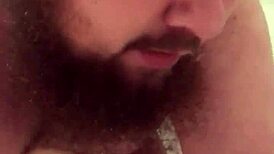 The young gay chub eagerly sucks the dildo before riding it passionately.