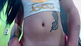 Transsexual Babe Teases in Pink Undies on Webcam