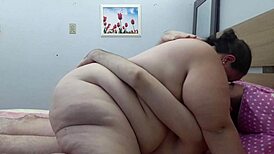 Romantic Couple Sharing Intimate Moments in Bed