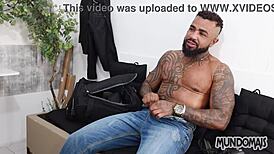 Behind the scenes, gay model gives blowjob to monster cock bareback.