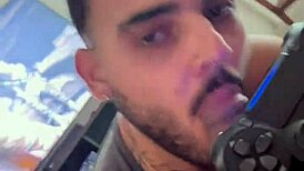 Sucking a big dick while he plays video games, part 2, in casual gay pornstar scene