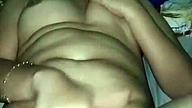 Shy office manager turns horny during late night hours.