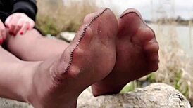 Goddess Teases with Feet in Tan Pantyhose in Spring Forest