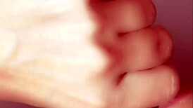 This Japanese wife is cheating with a monster cock in a close-up blowjob scene.