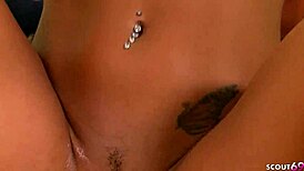 Tanned Blonde Bombshell with Pierced Tits Cheats for Massive Facial Cumshot