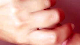 This Japanese wife is cheating with a monster cock in a close-up blowjob scene.