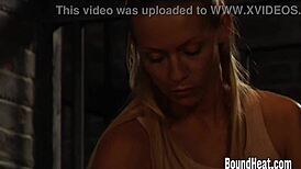 Two hot lesbian slaves are tied up and moaning under domination.