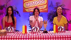 Dkye soaks her strapon at a wild hotdog eating contest.