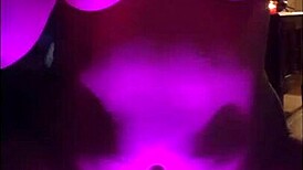 Latina woman teases with her big ass and rips clothes in striptease.