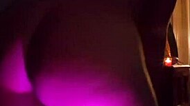 Latina woman teases with her big ass and rips clothes in striptease.