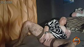 Klaudia Amber Girl fills her mouth with cum after solo masturbation in stockings and lingerie.
