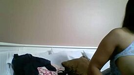 What huge toy does Maxine X slide deep in her slit?