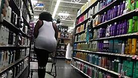 Candid Black Woman with Huge Natural Tits and Massive Booty on Display