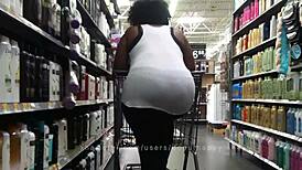 Candid Black Woman with Huge Natural Tits and Massive Booty on Display