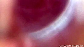 Horny wife indulges in solo pleasure while relaxing.