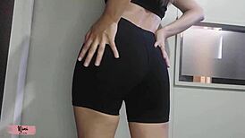 Nini tries on leggings, showing off her sexy petite figure