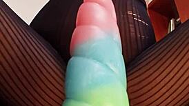 Watch this babe ride that monster cock dildo close-up, her wet hairy pussy getting filled and cumming hard.