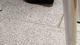 The dirt under the shoes of a sexy girl in tan nylons