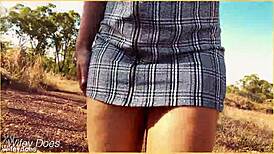 The wife accidentally forgets her panties and flashes her shaved pussy during an upskirt moment in the skirt.