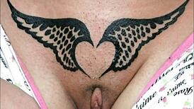 crystal butterfly with tattoos and music vibes