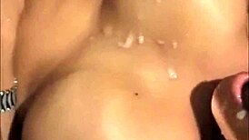 Shemale Covers Her Own Face with Hot Cum