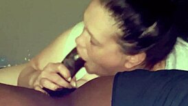 going wild sucking this beautiful big black cock in the bedroom.