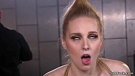 pale slave girl tied up and taking a huge cock in bondage