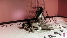 Naughty brunette and her man intensely play with dark oil and fuck doggy style.