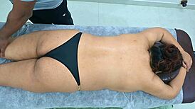 latina receives massage from black boy