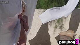 Tiny blonde teen strips in the garden while posing sexily