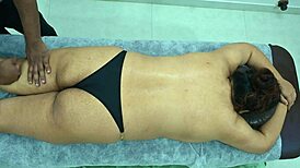 latina receives massage from black boy