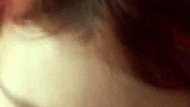 European redhead on knees sucking wrapped cock hungrily