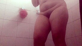 Watch gordibuena clean semen from her pussy in the shower?