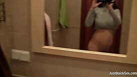 Busty amateur rubs her wet hairy bush