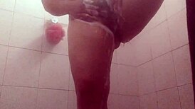 Watch gordibuena clean semen from her pussy in the shower?